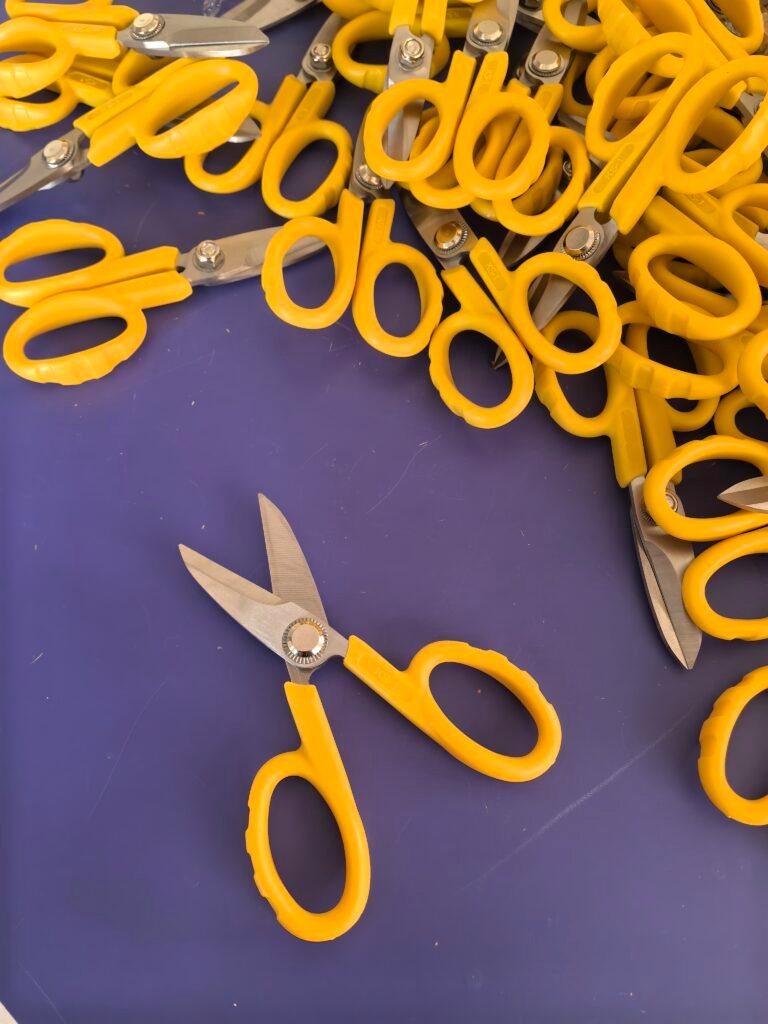 KS-1 Kevlar shears on the inspection table, every pair test-cut before shipping
